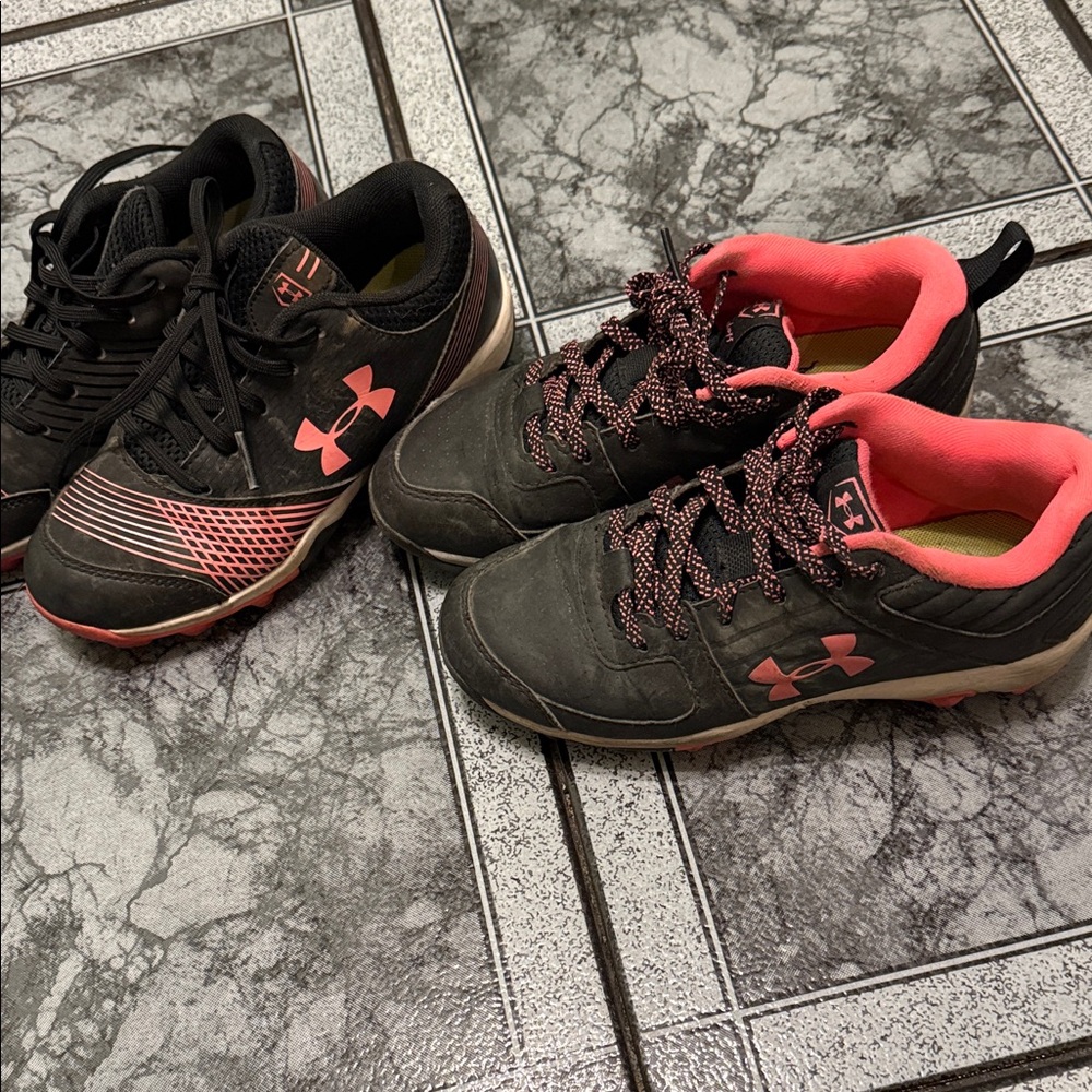 2 pair of Under Armour Black and Pink cleats (softball) size 1